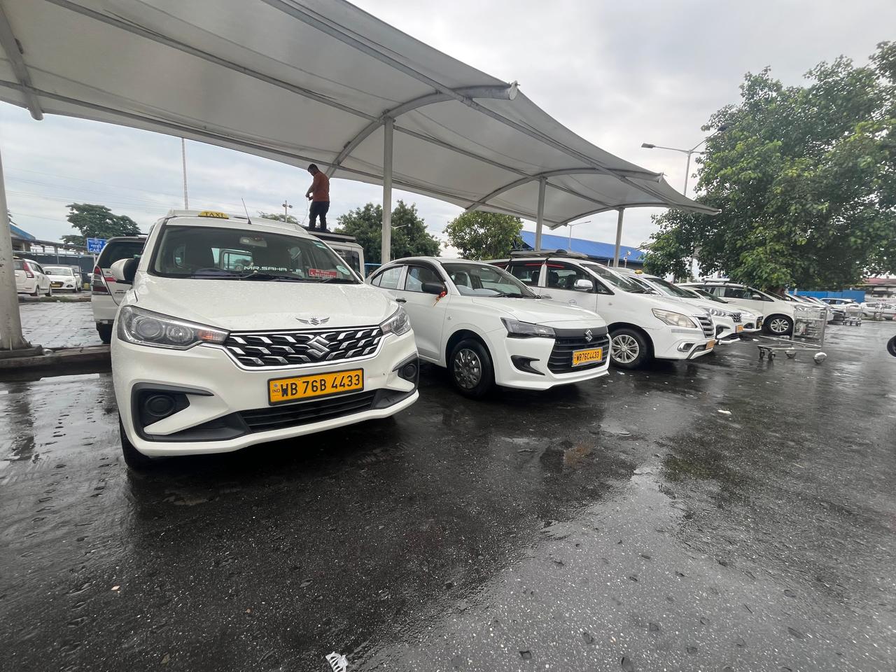 Swift Dzire car rental in Bagdogra for airport pickup and drop